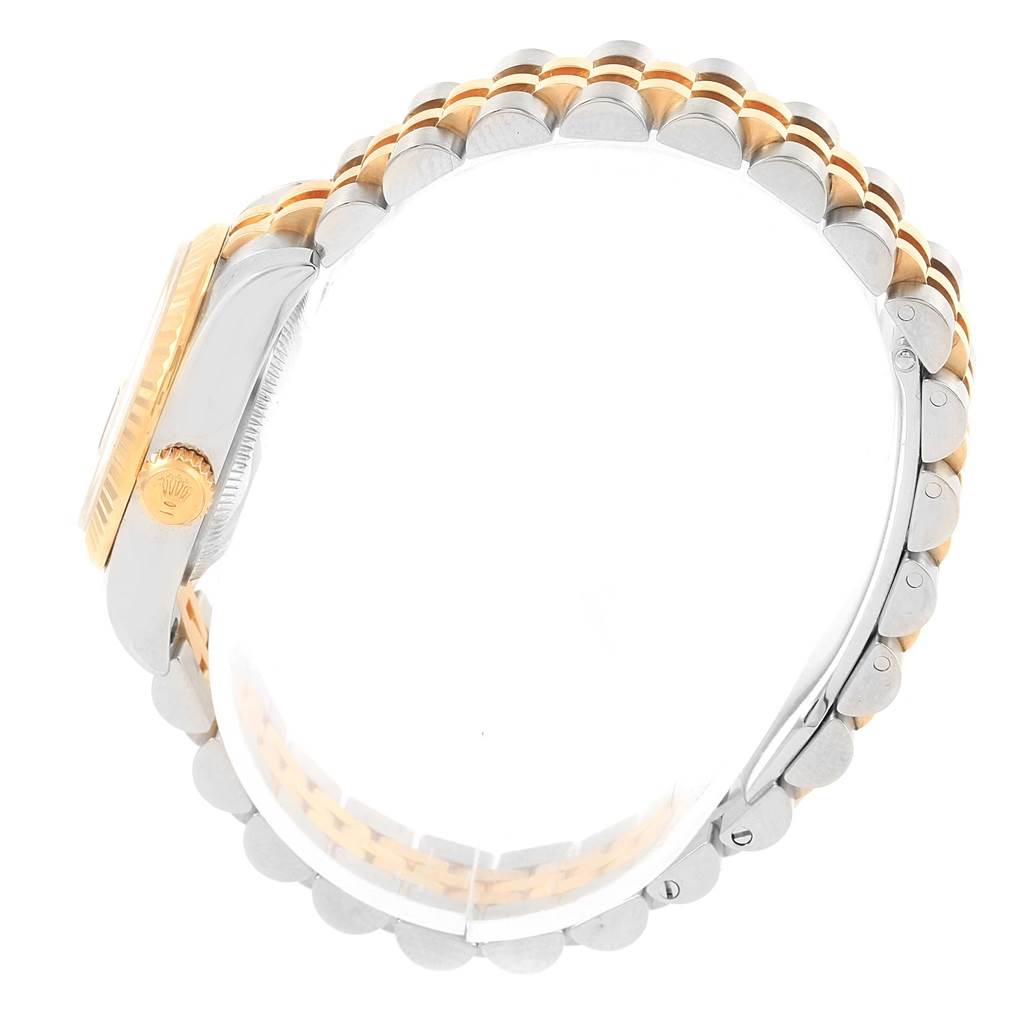 The image shows a side view of the Rolex 179173 Men's Steel and Gold (two tone) Black Dial 179173 Men's Steel and Gold (two tone) Black Dial Datejust Steel Yellow Gold Diamond Ladies Watch 179173, highlighting its crown, case, and bracelet.