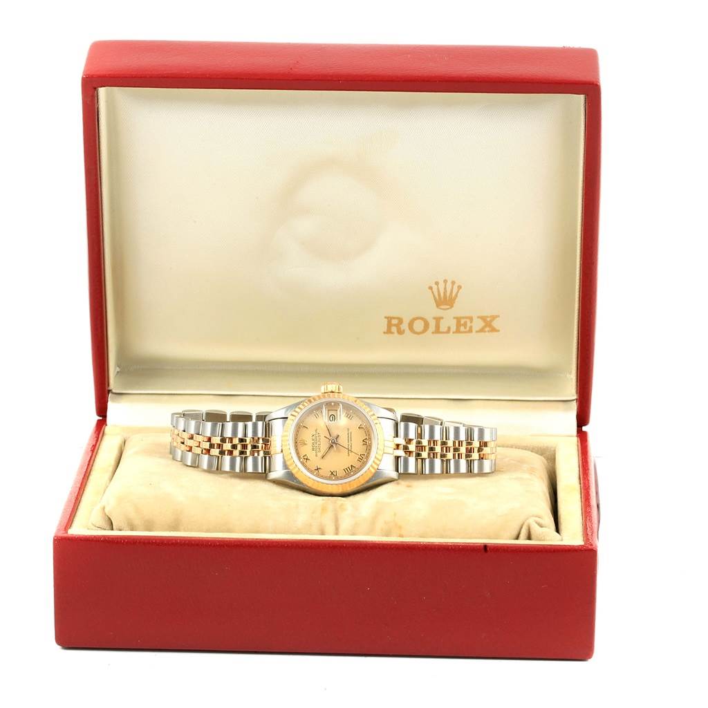 The image shows a front view of a Rolex Datejust 69163 Women's Stainless Steel Champagne Dial 69163 Women's Stainless Steel Champagne Dial watch inside an open red box with the brand's logo on the lid.
