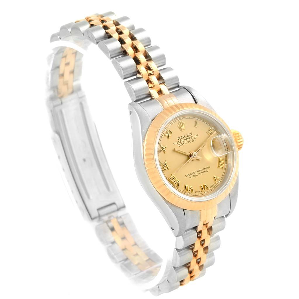 The image shows a Rolex Datejust 69163 Women's Stainless Steel Champagne Dial 69163 Women's Stainless Steel Champagne Dial watch from an angled side view, highlighting the face, bezel, and two-tone bracelet.