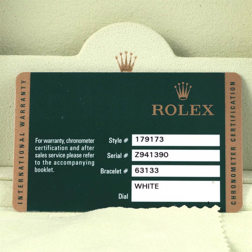 This image shows the warranty card for a Rolex Datejust 179173 Women's Steel and Gold (two tone) White Dial 179173 Women's Steel and Gold (two tone) White Dial watch, displaying style, serial, and bracelet numbers.