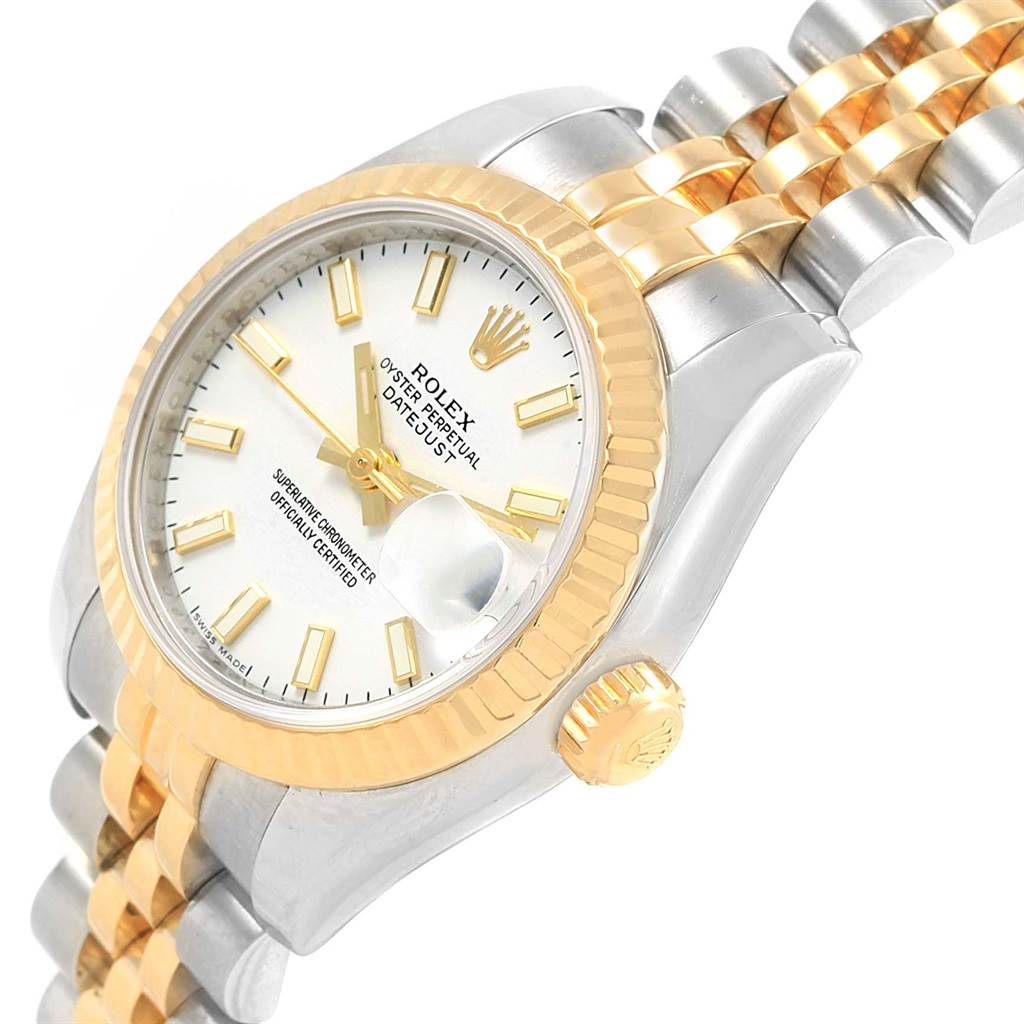 The image shows a Rolex Datejust 179173 Women's Steel and Gold (two tone) White Dial 179173 Women's Steel and Gold (two tone) White Dial watch at a slight angle, highlighting the dial, bezel, crown, and part of the bracelet.