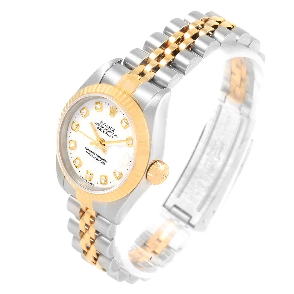 This Rolex Datejust 79173 Women's Stainless Steel White Dial 79173 Women's Stainless Steel White Dial model watch is shown at an angled side view, highlighting its bezel, dial, crown, and two-tone bracelet.