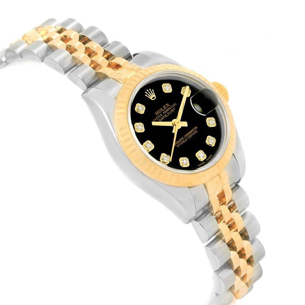 The Rolex Datejust 79173 Women's Stainless Steel Black Dial 79173 Women's Stainless Steel Black Dial watch is shown at an angled side view, highlighting its black dial, gold bezel, and two-tone bracelet.