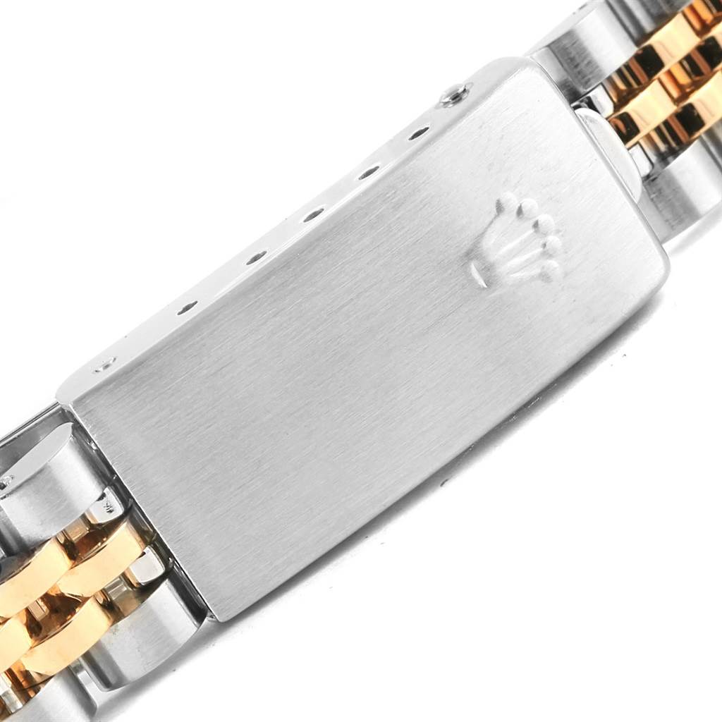The image shows a close-up of the clasp and part of the bracelet of a Rolex Datejust 69173 Women's Stainless Steel Champagne Dial 69173 Women's Stainless Steel Champagne Dial watch.
