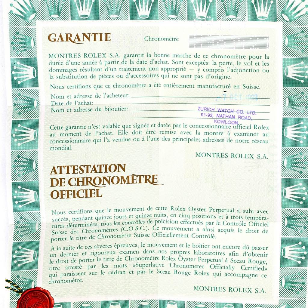 This image shows the warranty certificate for a Rolex Datejust 69173 Women's Stainless Steel Beige Dial 69173 Women's Stainless Steel Beige Dial watch, including purchase details and official chronometer certification.