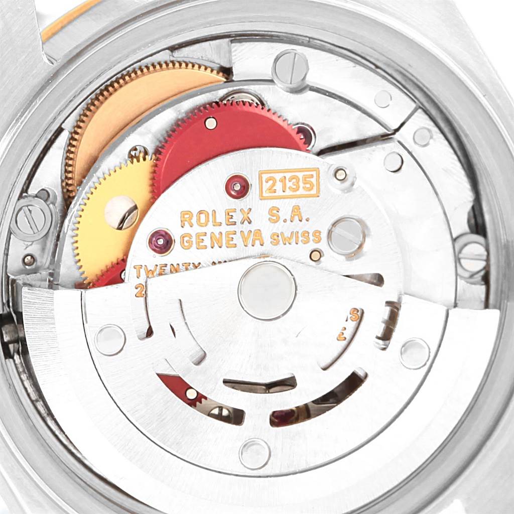 This image shows the internal movement mechanism of a Rolex Datejust 69173 Women's Stainless Steel Beige Dial 69173 Women's Stainless Steel Beige Dial watch, including gears and components.