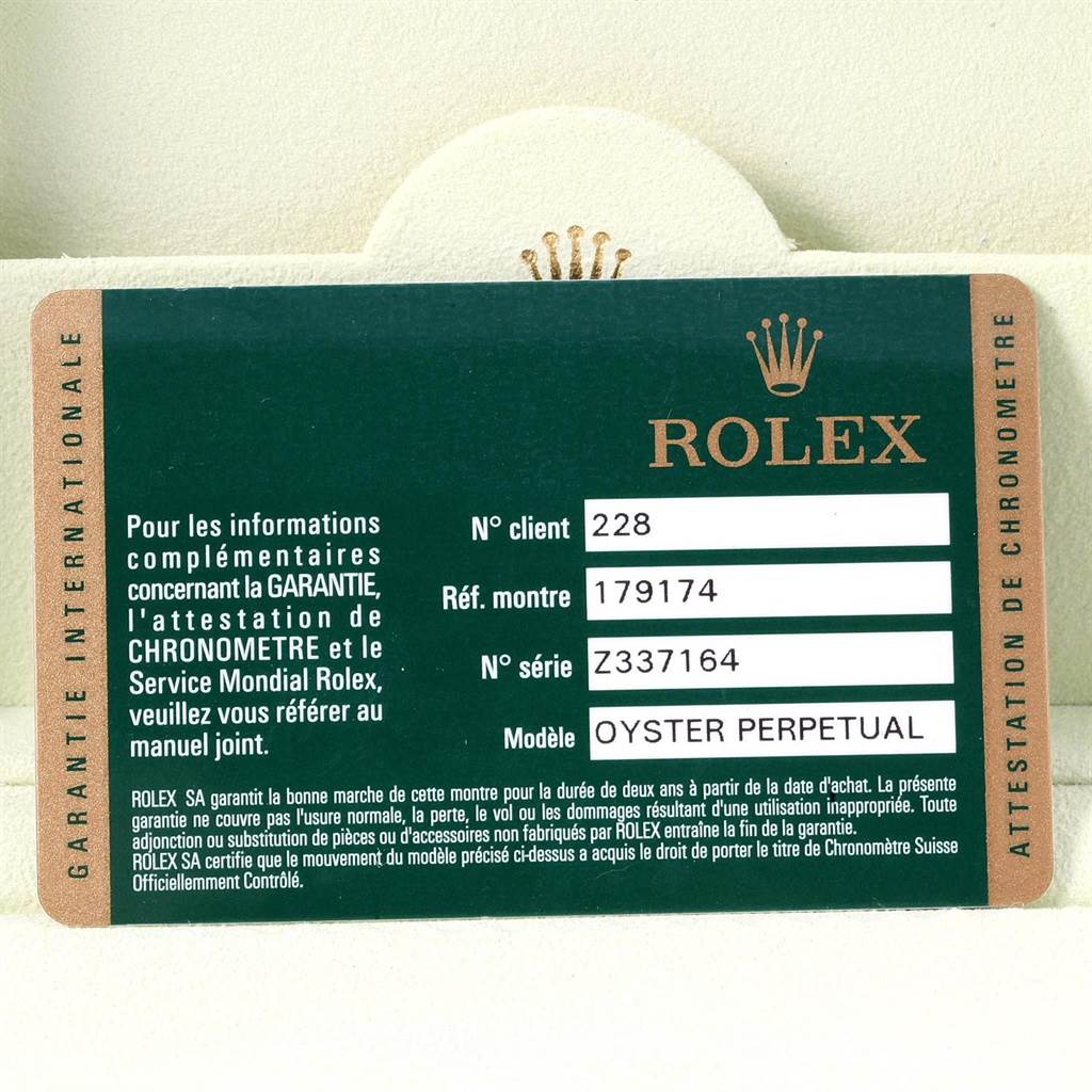 The image shows a guarantee card for the Rolex Datejust 179174 Women's Stainless Steel Blue Dial 179174 Women's Stainless Steel Blue Dial model, covering details like reference and serial numbers.