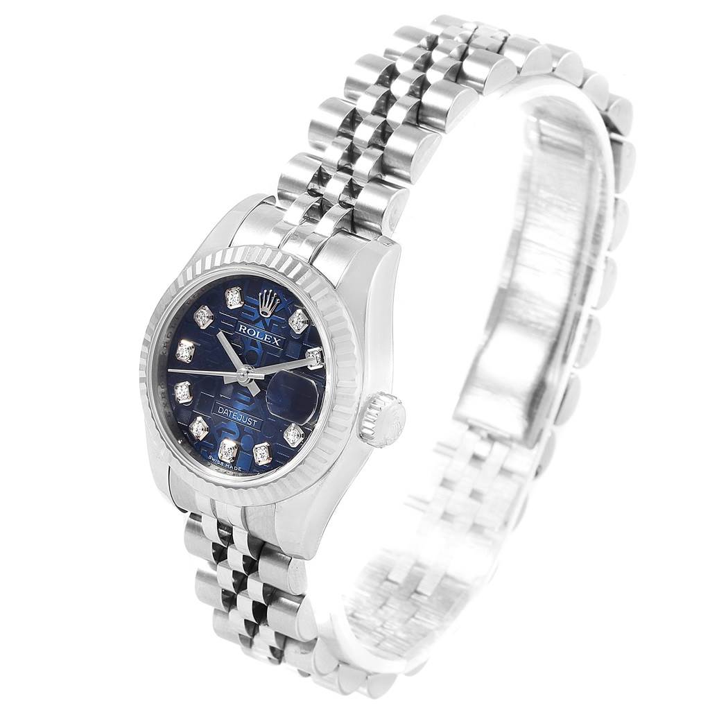 The Rolex Datejust 179174 Women's Stainless Steel Blue Dial 179174 Women's Stainless Steel Blue Dial watch is shown at a slight angle, highlighting its dial, bezel, and Jubilee bracelet.