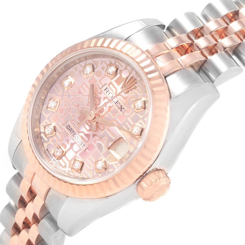 The image shows a Rolex Datejust 179171 Women
s Steel and Gold (two tone) Pink Dial 179171 Women
s Steel and Gold (two tone) Pink Dial watch at an angled view, highlighting the dial, bezel, and part of the bracelet.