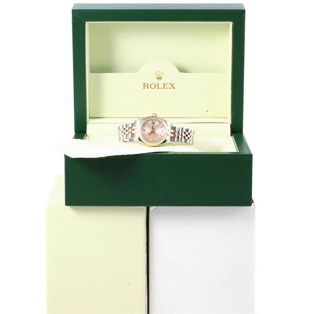 The image shows a Rolex Datejust 179171 Women
s Steel and Gold (two tone) Pink Dial 179171 Women
s Steel and Gold (two tone) Pink Dial watch placed in a green Rolex box, captured from a front angle.