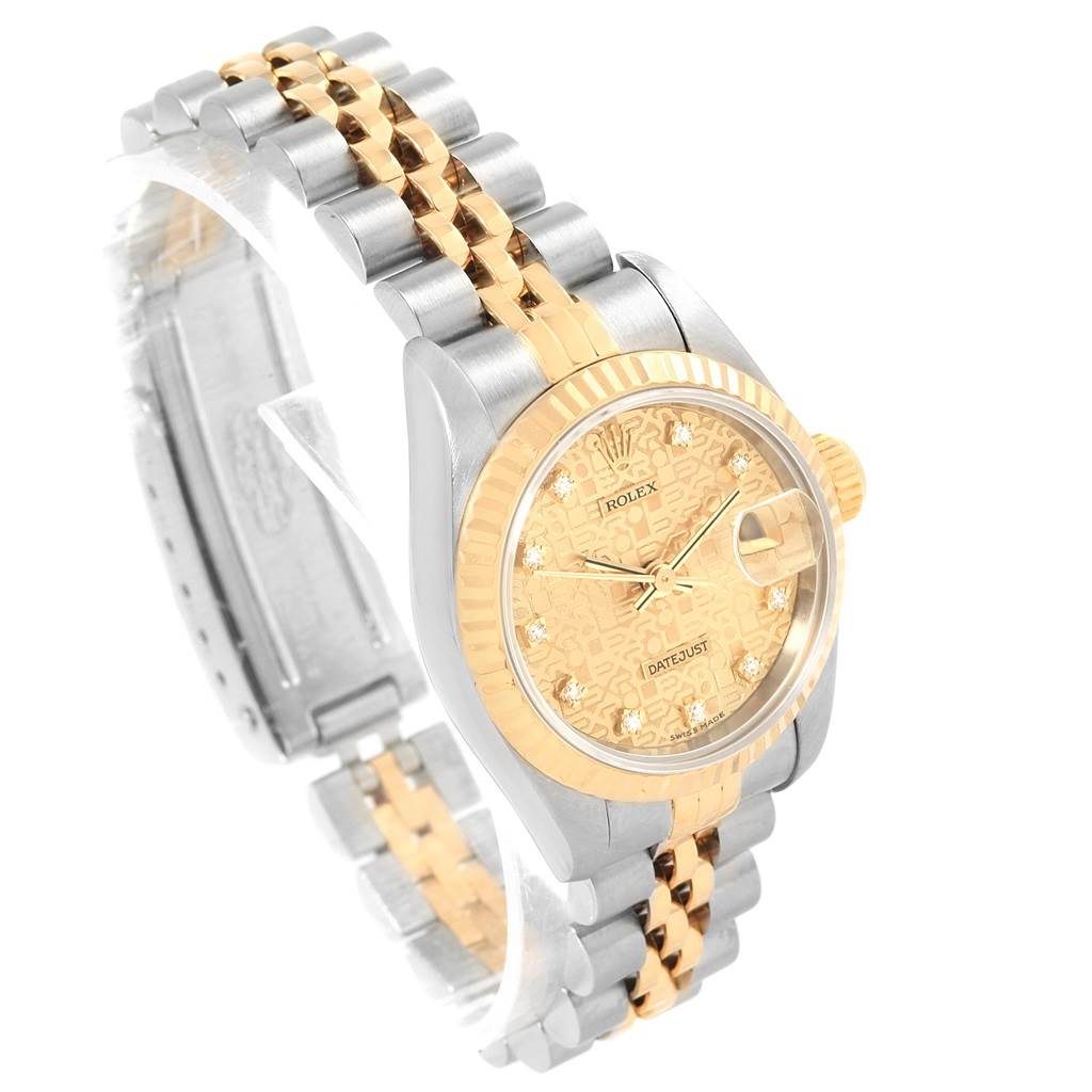 The image shows a side angle of a Rolex Datejust 69173 Women's Stainless Steel Champagne Dial 69173 Women's Stainless Steel Champagne Dial watch featuring its two-tone bracelet, dial, crown, and case.