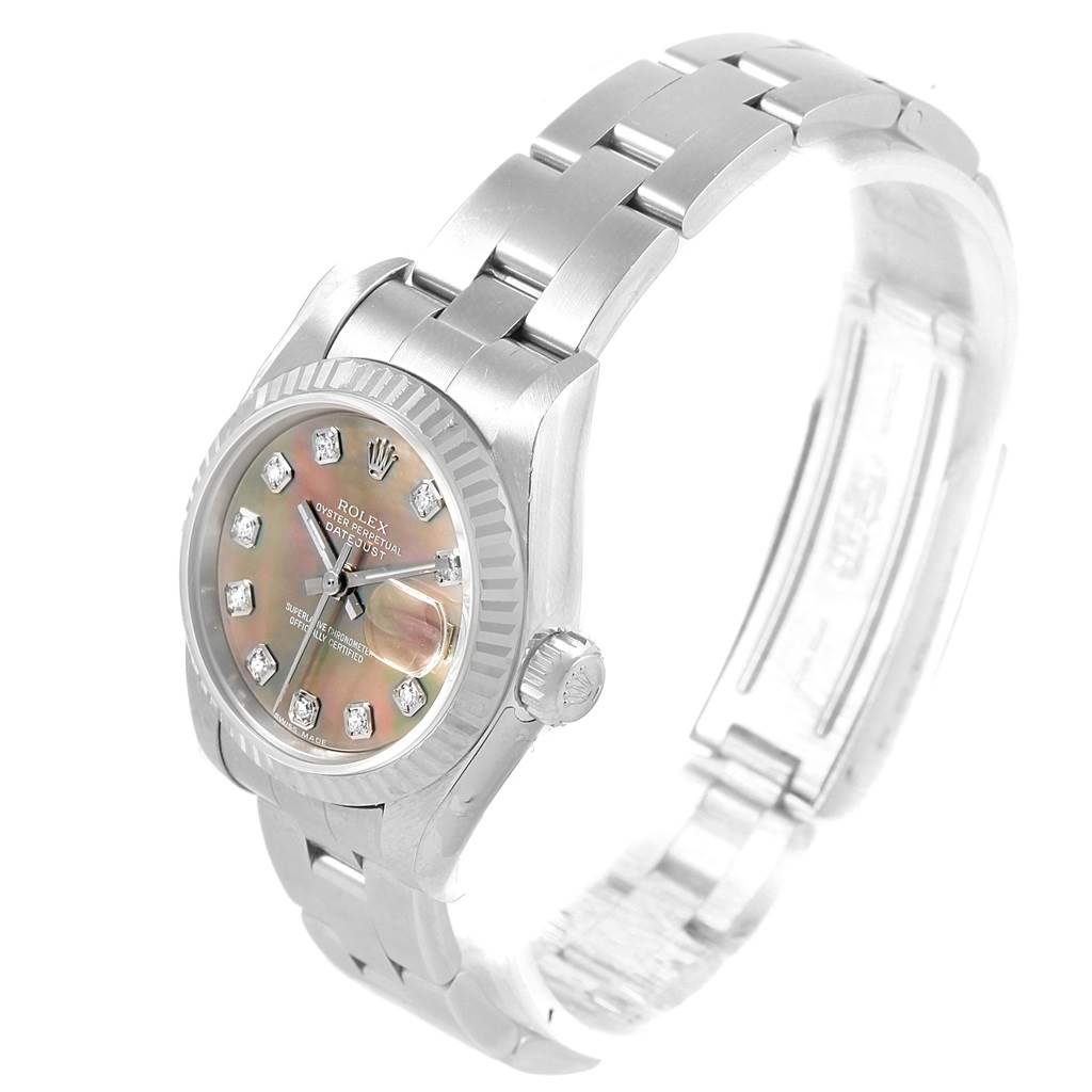 The image shows a Rolex Datejust 79174 Women
s Stainless Steel Mother of Pearl Dial 79174 Women
s Stainless Steel Mother of Pearl Dial watch at an angled view, focusing on the face, bezel, crown, and part of the bracelet.