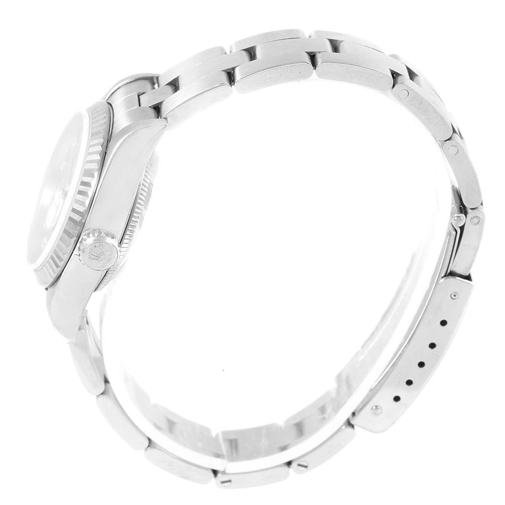 The image shows a side profile view of the Rolex Datejust 79174 Women
s Stainless Steel Mother of Pearl Dial 79174 Women
s Stainless Steel Mother of Pearl Dial watch, highlighting the bracelet, case, and crown.