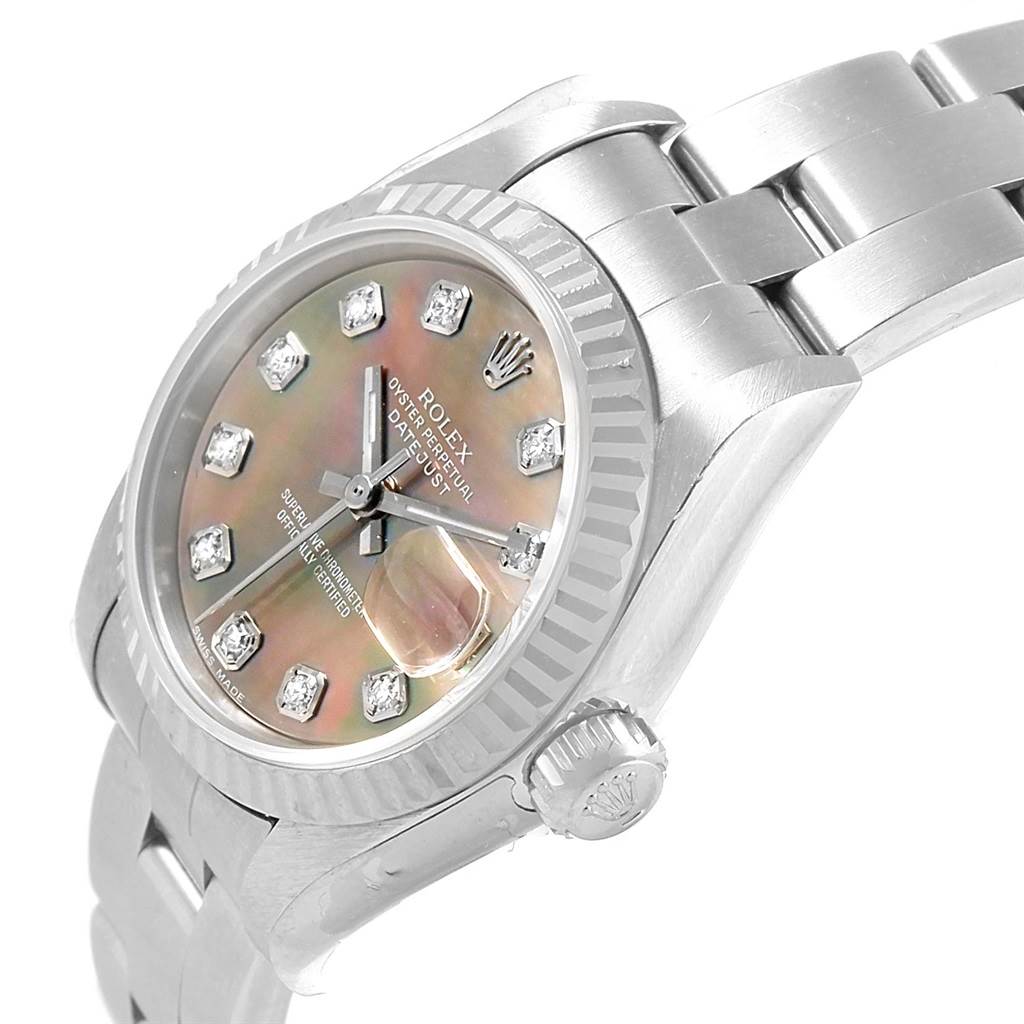 The image shows a Rolex Datejust 79174 Women
s Stainless Steel Mother of Pearl Dial 79174 Women
s Stainless Steel Mother of Pearl Dial watch at a slight angle, highlighting the face, crown, and part of the bracelet.