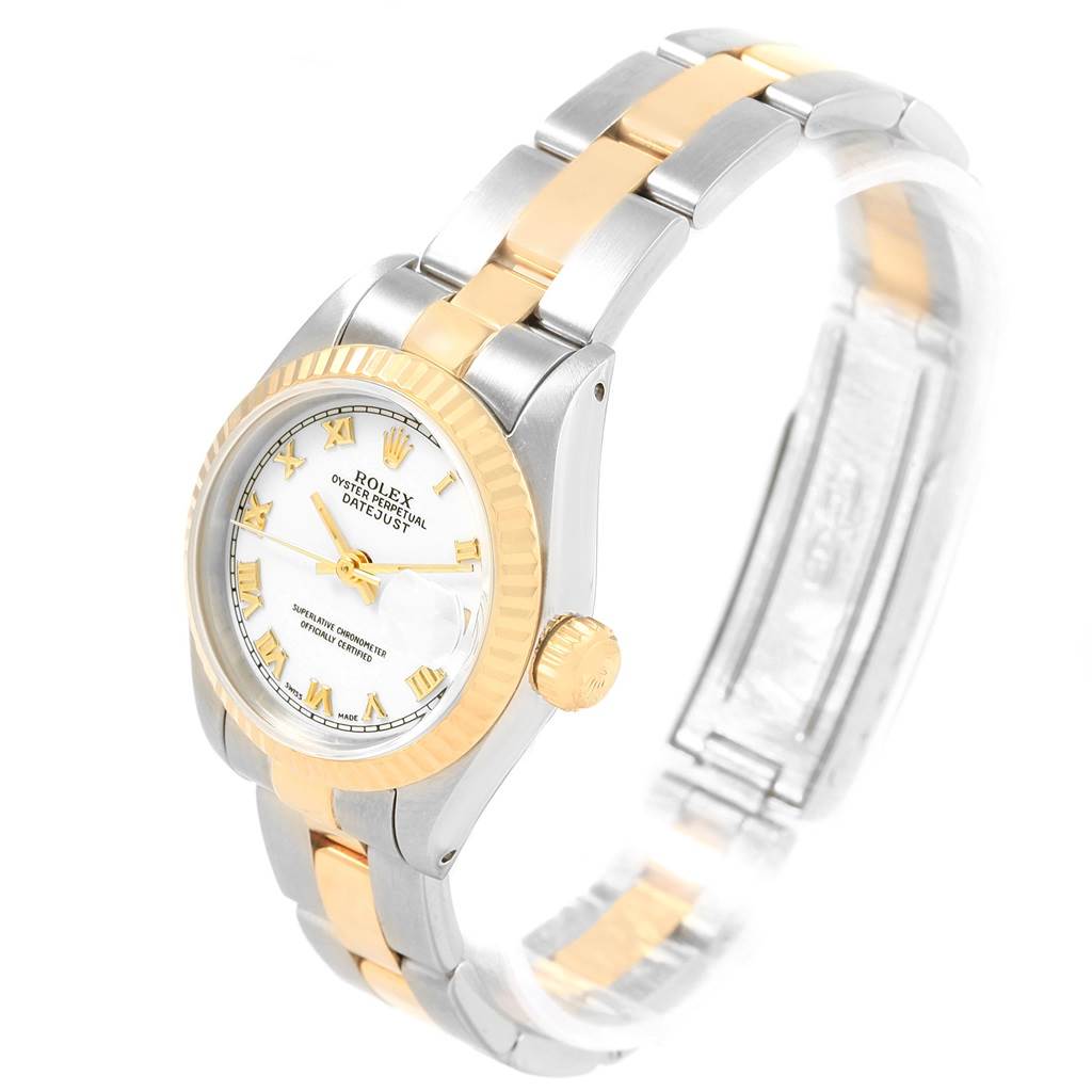 The image shows a Rolex Datejust 69173 Women
s Stainless Steel White Dial 69173 Women
s Stainless Steel White Dial watch at an angle highlighting the dial, crown, and part of the two-tone bracelet.