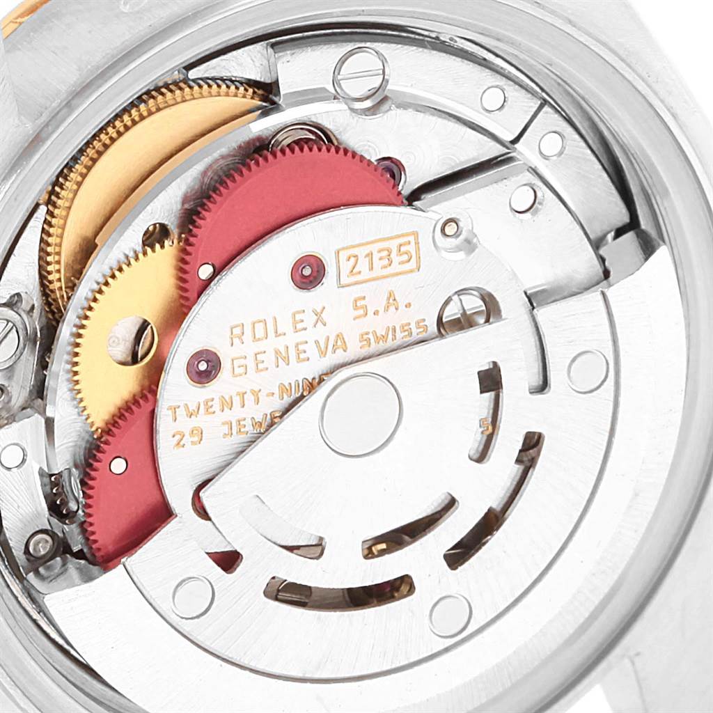 This image shows the intricate internal mechanism of the Rolex Datejust 69173 Women
s Stainless Steel White Dial 69173 Women
s Stainless Steel White Dial watch, focusing on its gears and components.