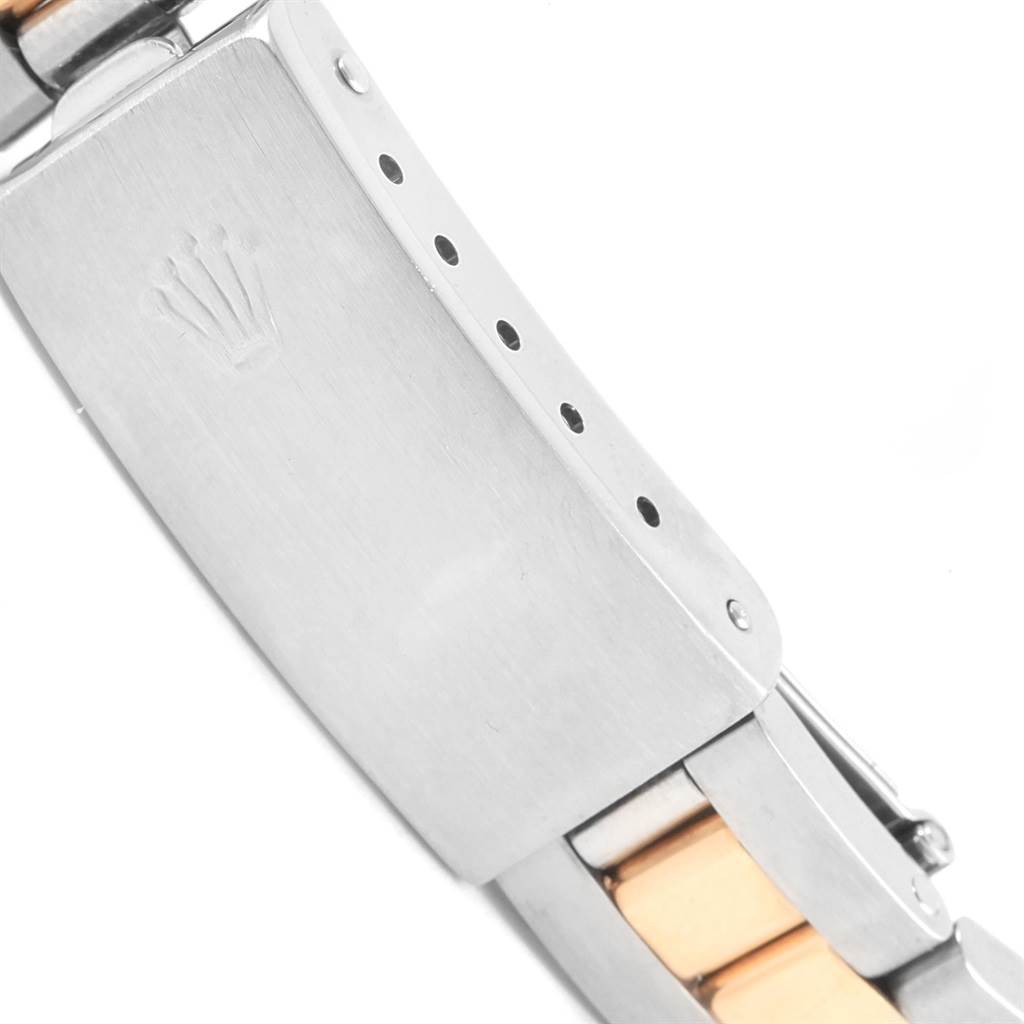 Close-up side view of the Rolex Datejust 69173 Women
s Stainless Steel White Dial 69173 Women
s Stainless Steel White Dial
s clasp and part of the bracelet.