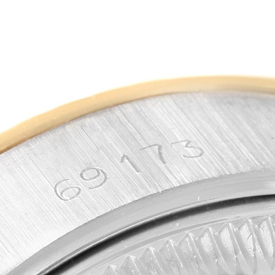 This close-up shows the case serial number of a Rolex Datejust 69173 Women
s Stainless Steel White Dial 69173 Women
s Stainless Steel White Dial watch.