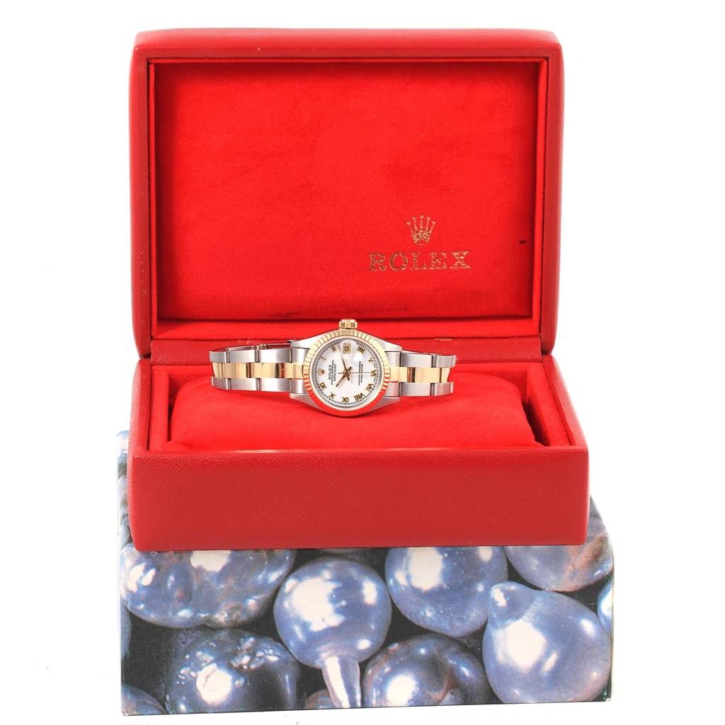 This image shows a Rolex Datejust 69173 Women
s Stainless Steel White Dial 69173 Women
s Stainless Steel White Dial watch placed inside an open red Rolex box, shot from a straight-on angle.
