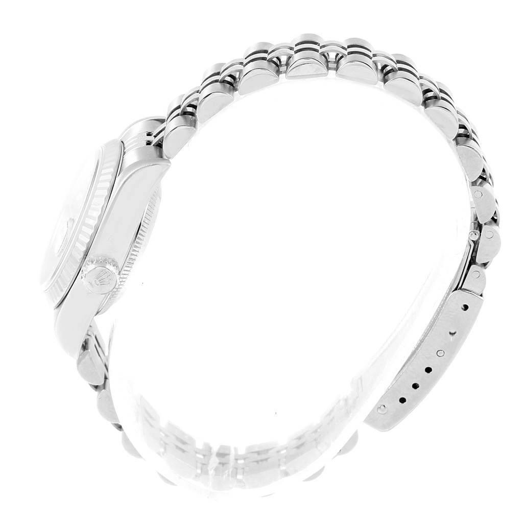 The image shows a side view of a Rolex Datejust 79174 Women's Stainless Steel Blue Dial 79174 Women's Stainless Steel Blue Dial watch, highlighting its bracelet and the right side of the case.