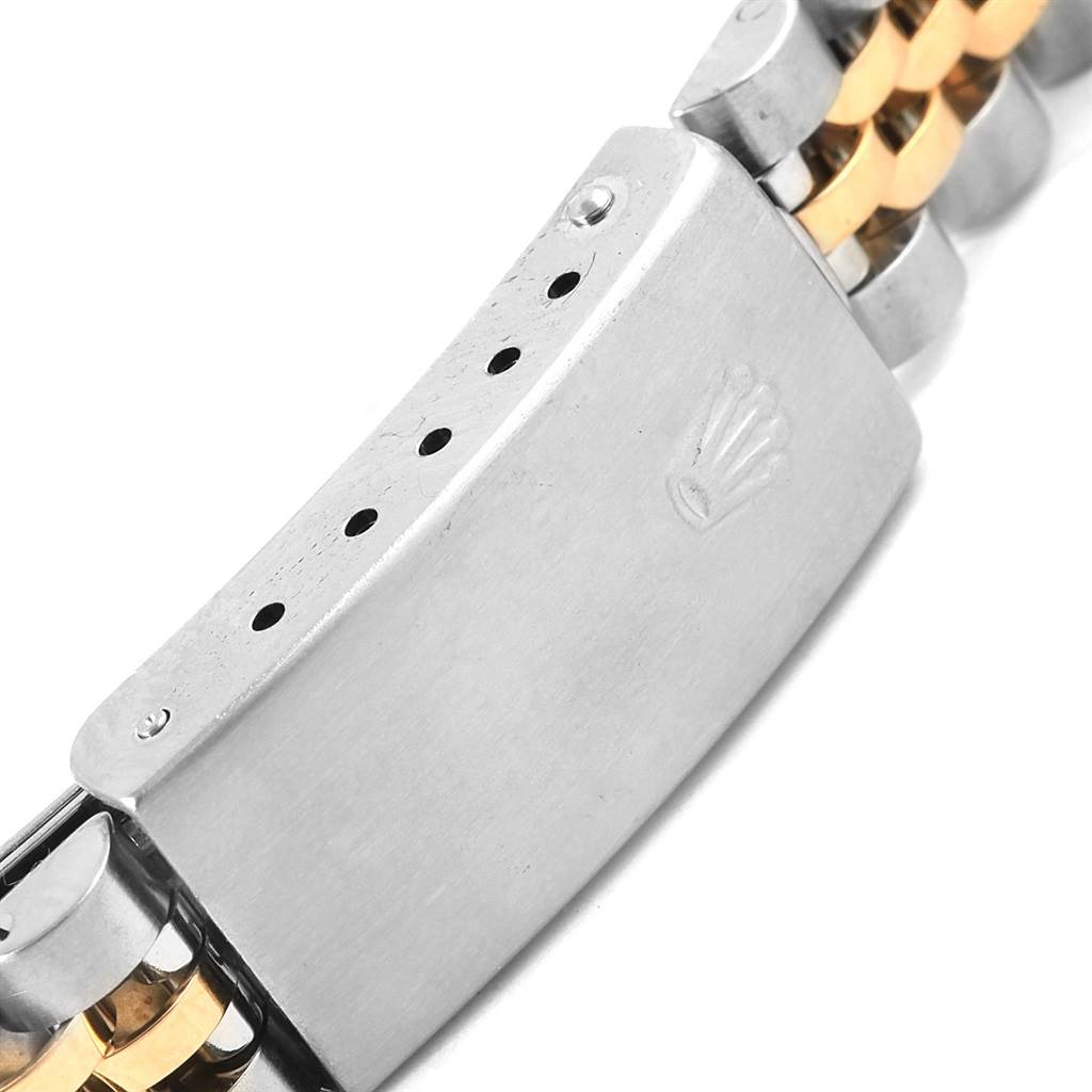 This image shows a close-up view of the clasp of a Rolex Datejust 69173 Women's Stainless Steel White Dial 69173 Women's Stainless Steel White Dial watch bracelet.