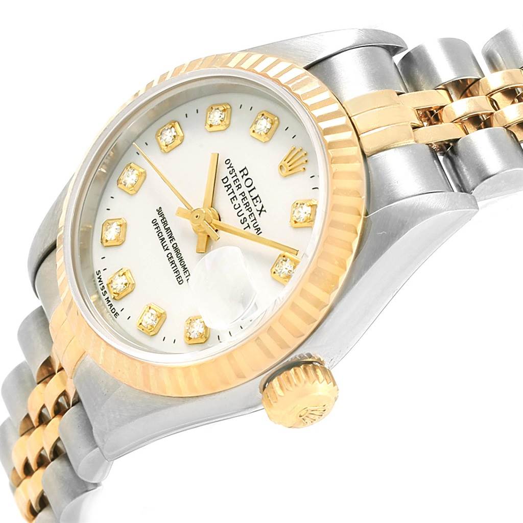 The image shows a Rolex Datejust 69173 Women's Stainless Steel White Dial 69173 Women's Stainless Steel White Dial watch at an angled side view, highlighting the bezel, dial, crown, and part of the bracelet.