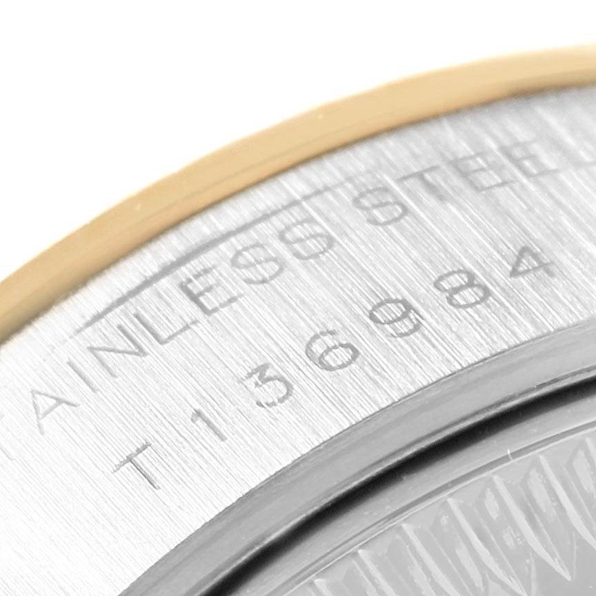 This close-up image shows the engraved serial number and "STAINLESS STEEL" text on the back of a Rolex Datejust 69173 Women's Stainless Steel Silver Dial 69173 Women's Stainless Steel Silver Dial watch.