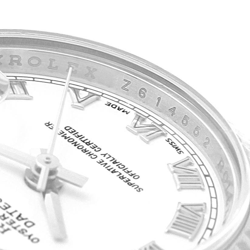 This image shows a close-up angle of the dial and part of the inner bezel of a Rolex Datejust 179174 Women
s Stainless Steel White Dial 179174 Women
s Stainless Steel White Dial watch.