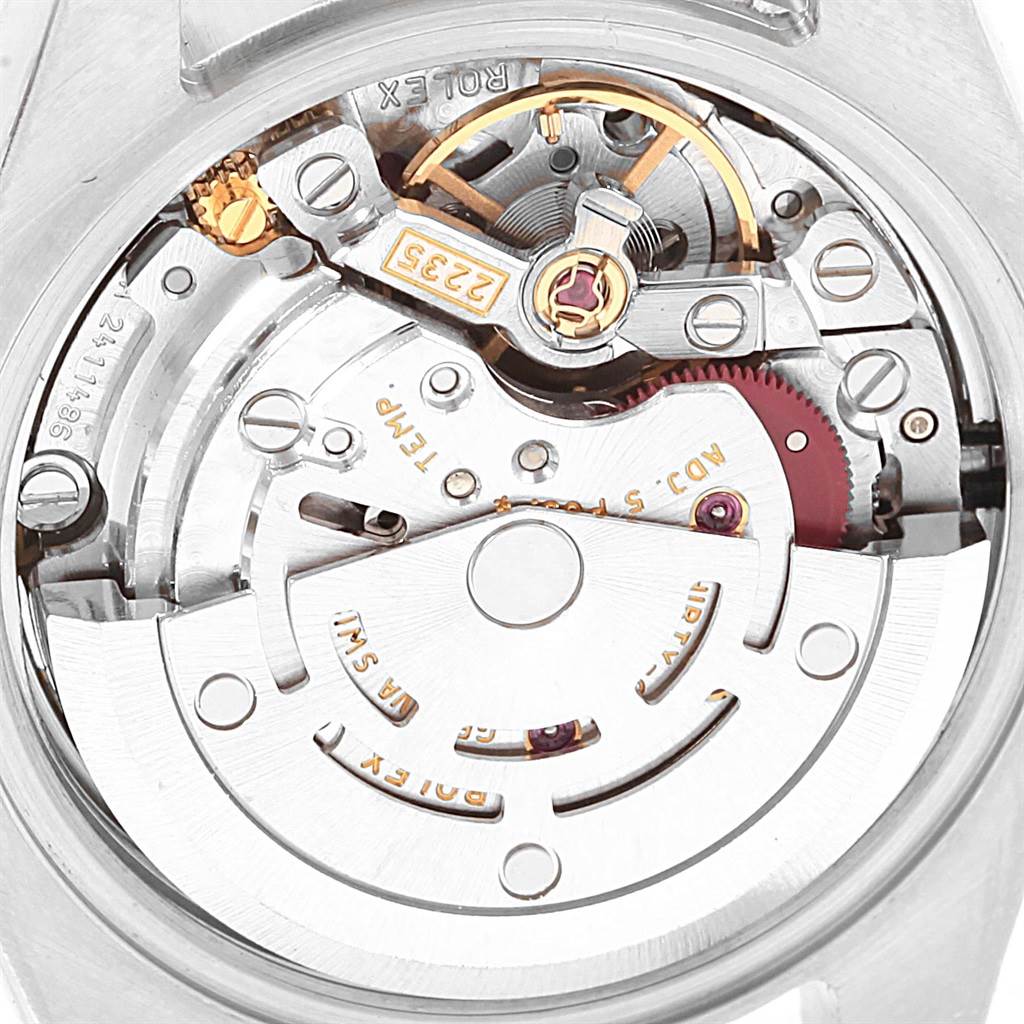 This image shows a close-up view of the movement and internal mechanics of a Rolex Datejust 179174 Women
s Stainless Steel White Dial 179174 Women
s Stainless Steel White Dial watch.