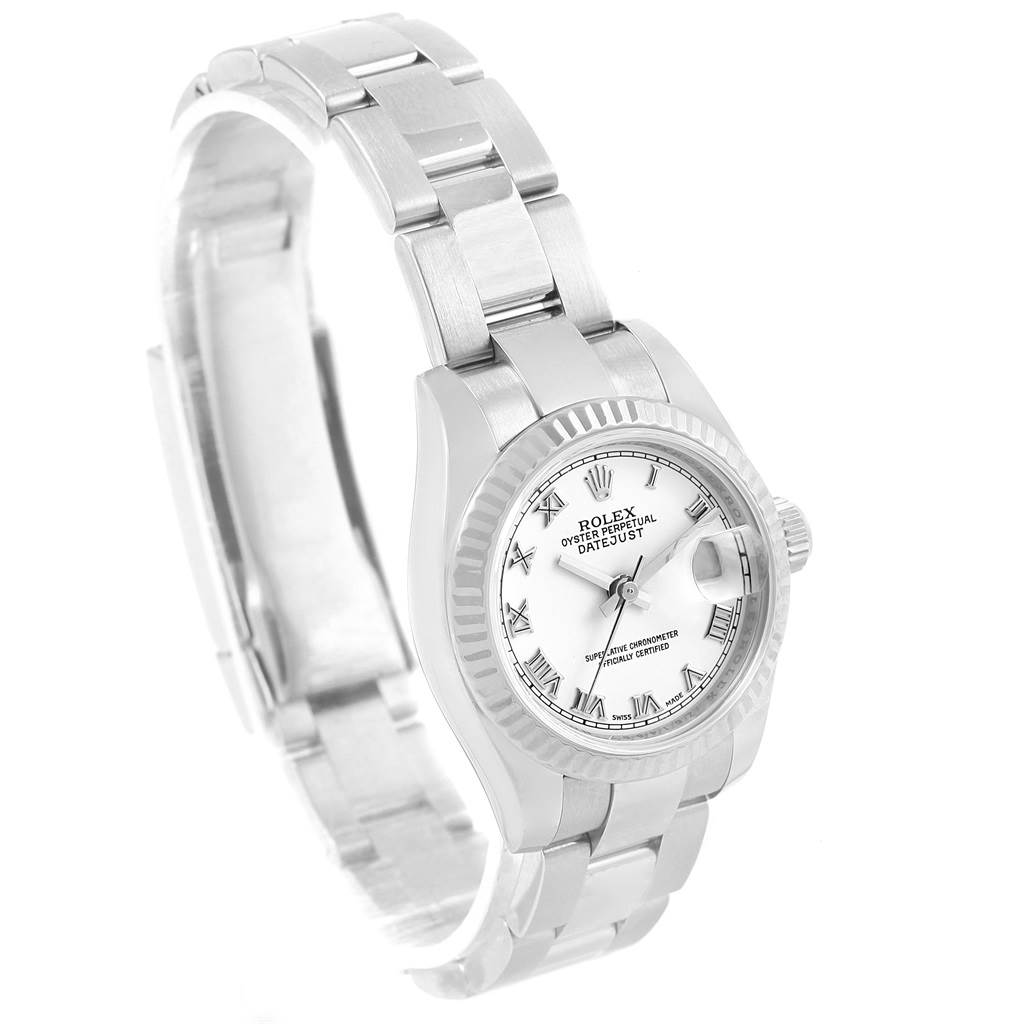 The image shows a side angle view of the Rolex Datejust 179174 Women
s Stainless Steel White Dial 179174 Women
s Stainless Steel White Dial model, highlighting the dial, bezel, bracelet, and clasp.