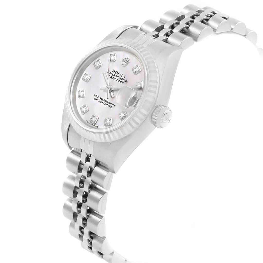 The Rolex Datejust 79174 Women
s Stainless Steel Mother of Pearl Dial 79174 Women
s Stainless Steel Mother of Pearl Dial watch is shown at an angle highlighting its face, bezel, and partial bracelet.