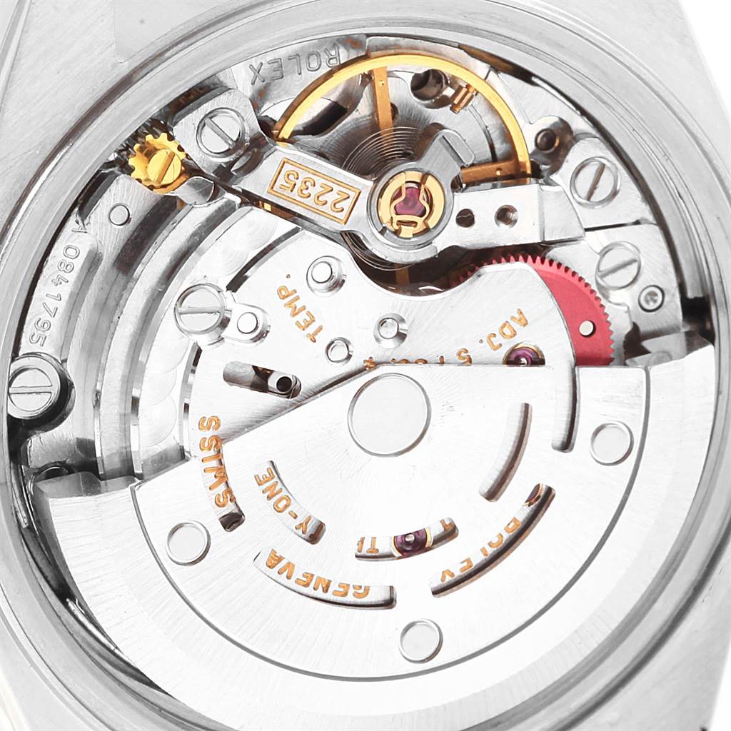 This close-up image shows the intricate mechanical movement of a Rolex Datejust 79174 Women
s Stainless Steel Mother of Pearl Dial 79174 Women
s Stainless Steel Mother of Pearl Dial watch.