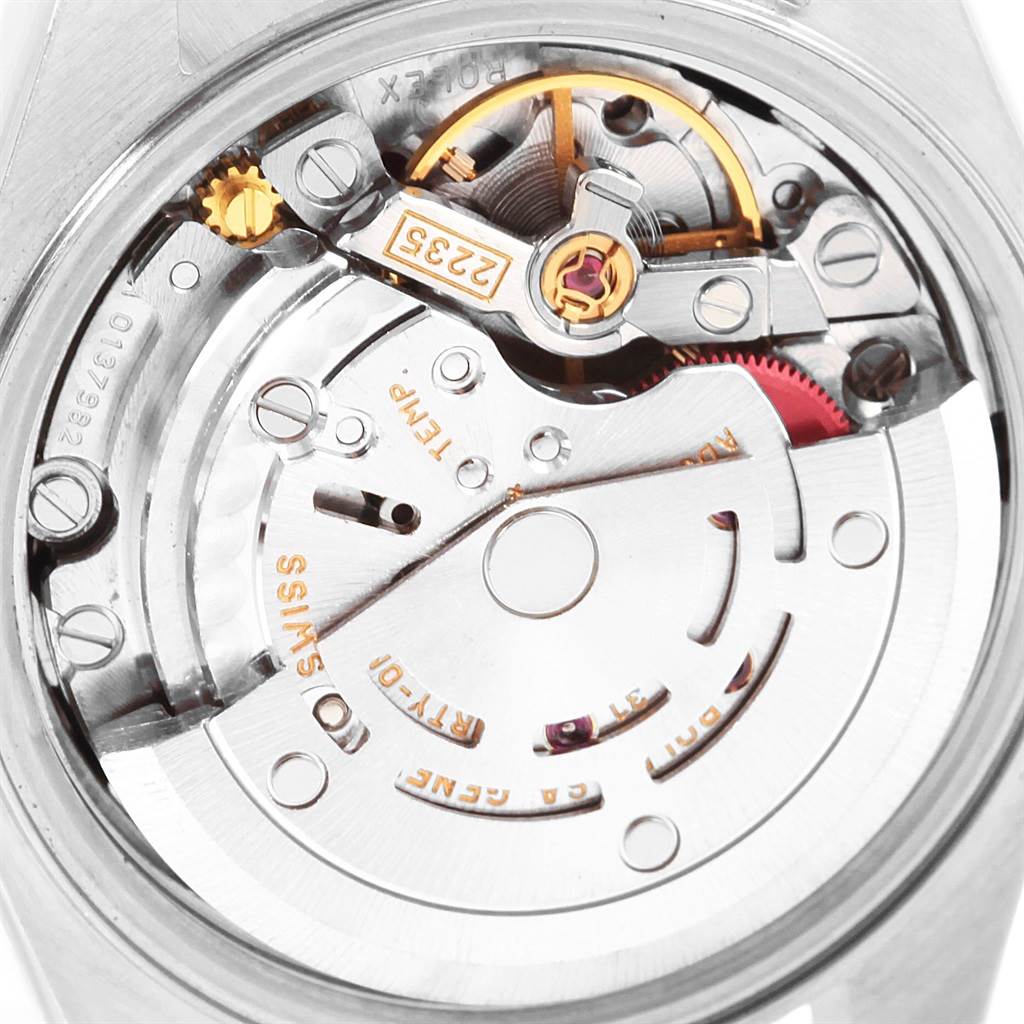 This image shows a close-up of the internal movement mechanism of a Rolex Datejust 79173 Women
s Steel and Gold (two tone) Black Dial 79173 Women
s Steel and Gold (two tone) Black Dial watch.