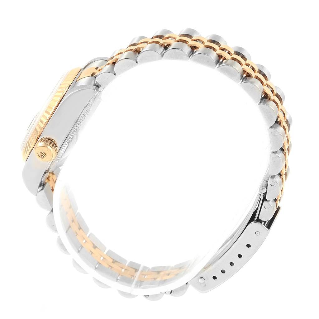 The image shows a side view of a Rolex Datejust 79173 Women
s Steel and Gold (two tone) Black Dial 79173 Women
s Steel and Gold (two tone) Black Dial, focusing on its two-tone bracelet and part of the case.