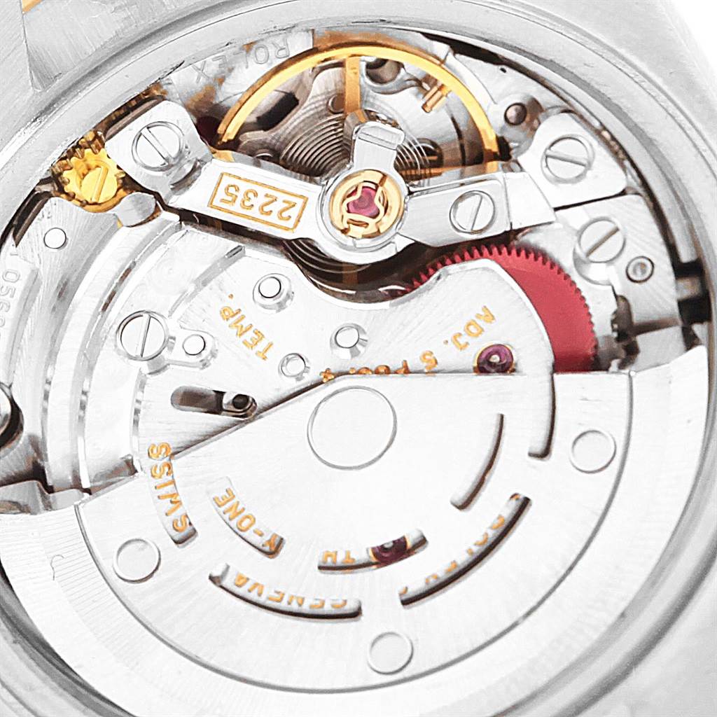 This image of a Rolex Datejust 79173 Women's Steel and Gold (two tone) Silver Dial 79173 Women's Steel and Gold (two tone) Silver Dial watch shows a close-up view of its internal mechanical movement from the back.