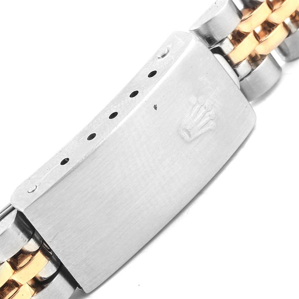 The image shows the clasp and part of the bracelet of a Rolex Datejust 79173 Women's Steel and Gold (two tone) Silver Dial 79173 Women's Steel and Gold (two tone) Silver Dial watch with a two-tone metal design.