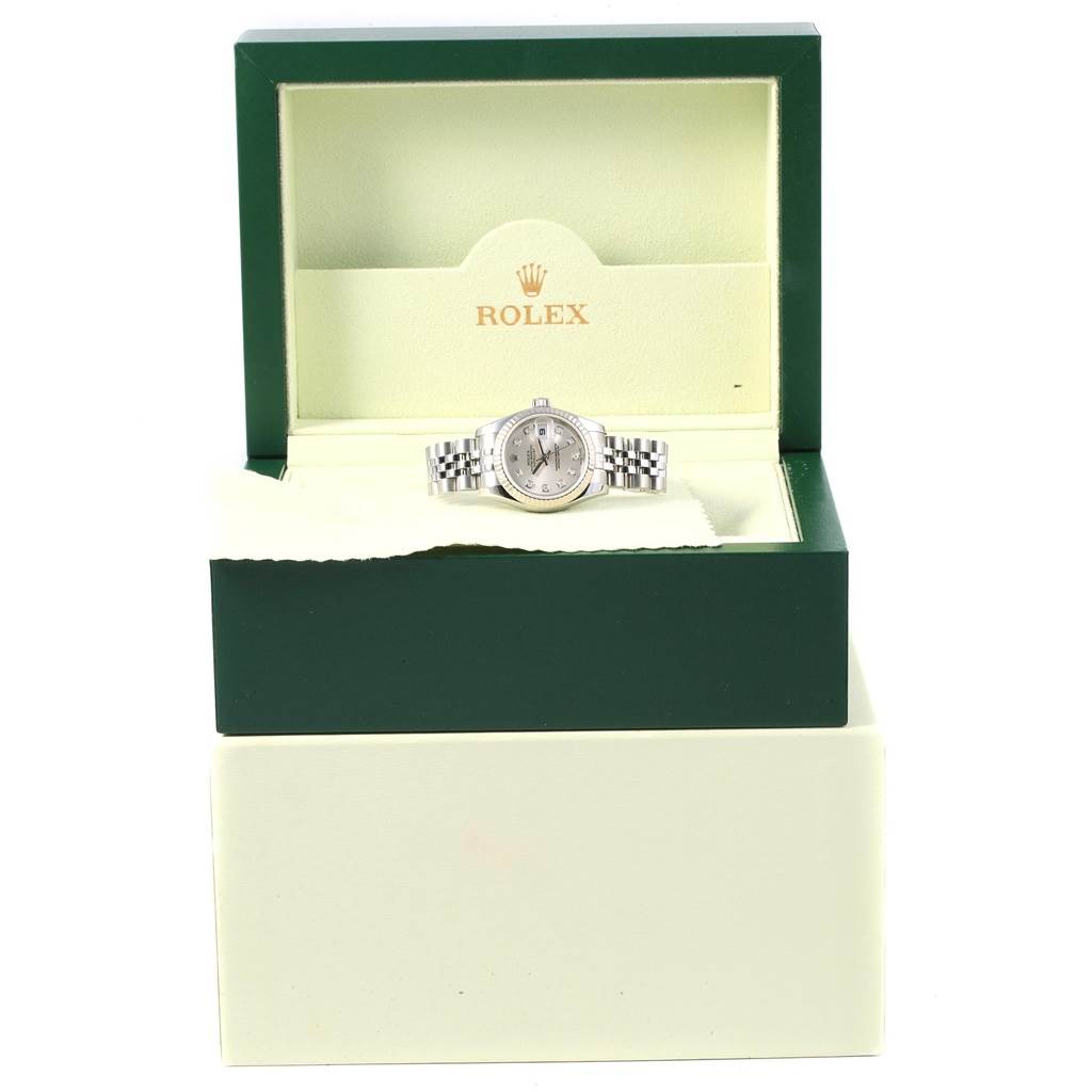 The image shows a Rolex Datejust 179174 Women's Stainless Steel Silver Dial 179174 Women's Stainless Steel Silver Dial watch in its green and cream-colored box, viewed from the front.