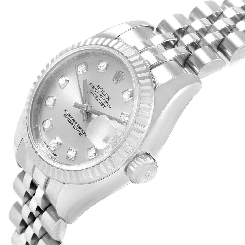This image shows a Rolex Datejust 179174 Women's Stainless Steel Silver Dial 179174 Women's Stainless Steel Silver Dial watch from an angled side view, highlighting the dial, crown, and bracelet.