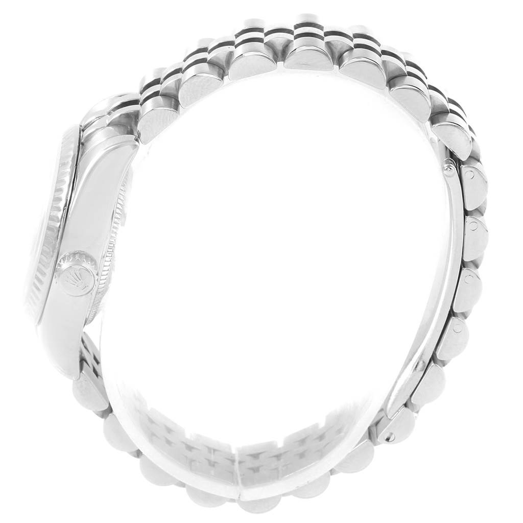 The image shows a side profile of a Rolex Datejust 179174 Women
s Stainless Steel Mother of Pearl Dial 179174 Women
s Stainless Steel Mother of Pearl Dial model, highlighting its case, bezel, crown, and bracelet.