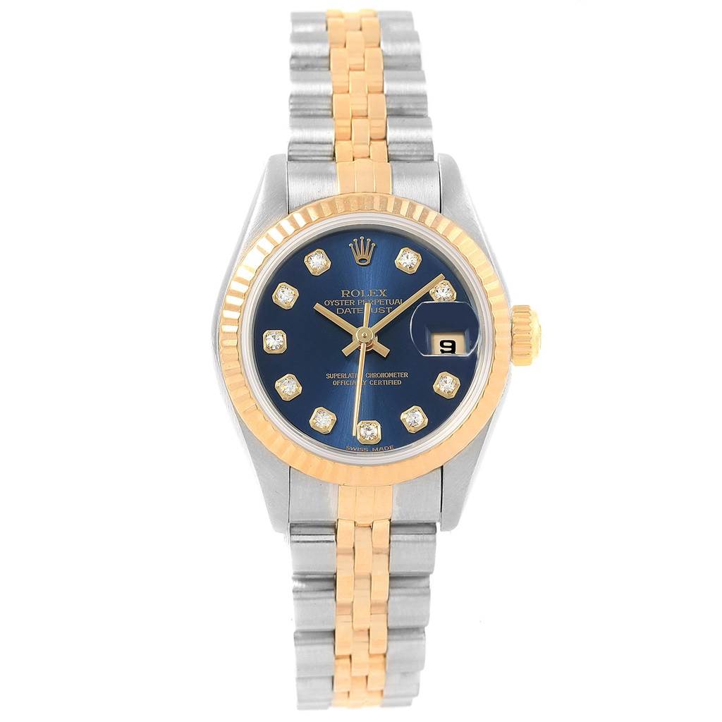 This Rolex Datejust 79173 Women
s Stainless Steel Blue Dial 79173 Women
s Stainless Steel Blue Dial watch is shown from a top-down angle, displaying its two-tone bracelet, blue dial, and date window at 3 o
clock.
