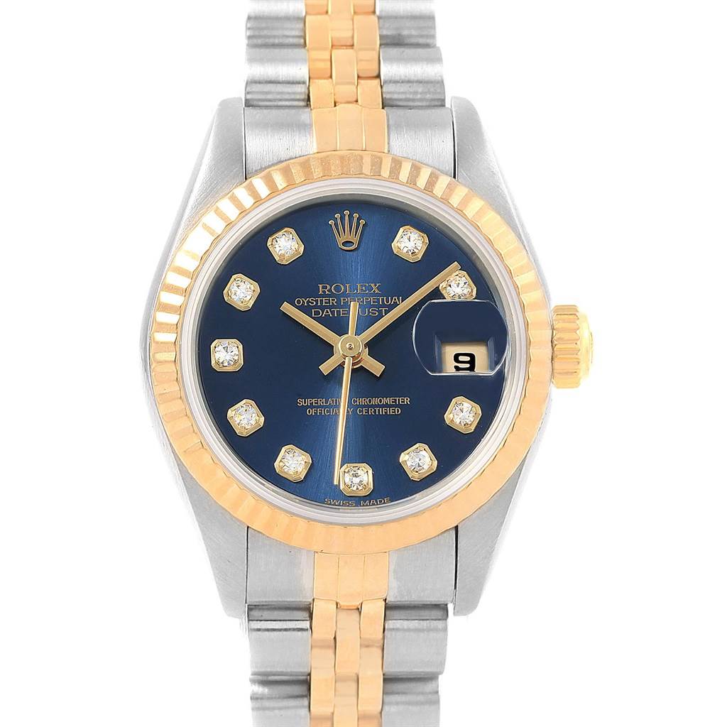 The image shows a Rolex Datejust 79173 Women
s Stainless Steel Blue Dial 79173 Women
s Stainless Steel Blue Dial watch displayed from the front, highlighting its blue dial, diamond hour markers, and two-tone bracelet.