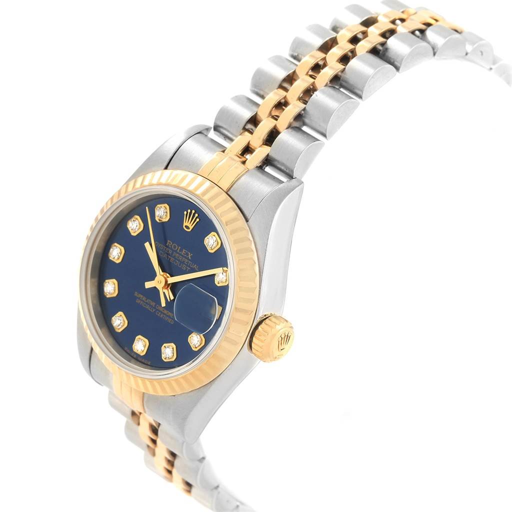 The Rolex Datejust 79173 Women
s Stainless Steel Blue Dial 79173 Women
s Stainless Steel Blue Dial watch is shown at a slight side angle displaying the dial, bezel, crown, and part of the bracelet.