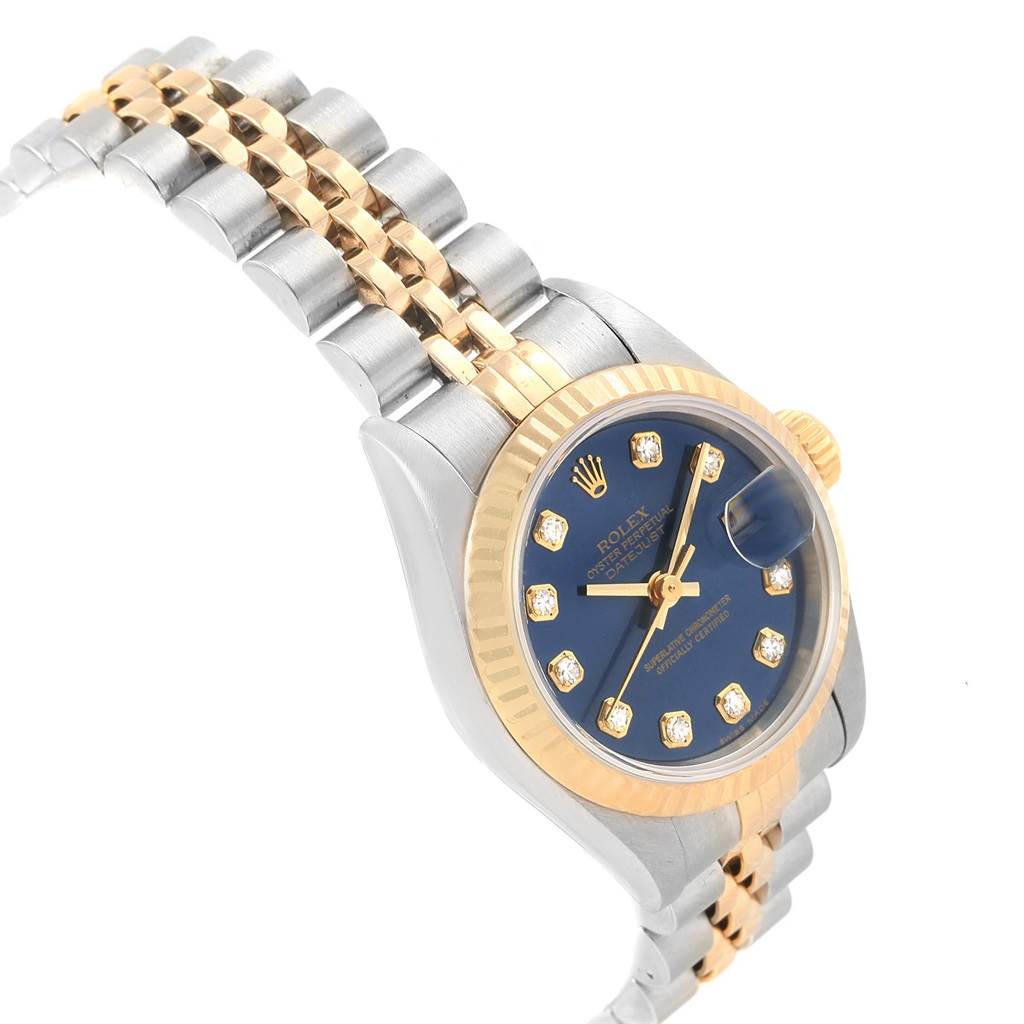 The image shows a side angle of a Rolex Datejust 79173 Women
s Stainless Steel Blue Dial 79173 Women
s Stainless Steel Blue Dial watch, highlighting the bracelet, bezel, and blue dial.
