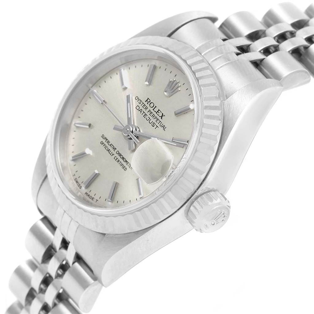 This image shows a side angle of the Rolex Datejust 69174 Women's Stainless Steel Silver Dial 69174 Women's Stainless Steel Silver Dial watch, focusing on the face, bezel, crown, and part of the bracelet.