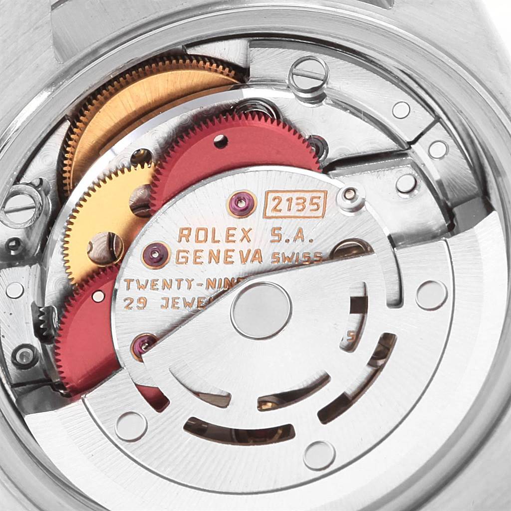 The image shows a detailed view of the movement mechanism inside a Rolex Datejust 69174 Women's Stainless Steel Silver Dial 69174 Women's Stainless Steel Silver Dial watch.
