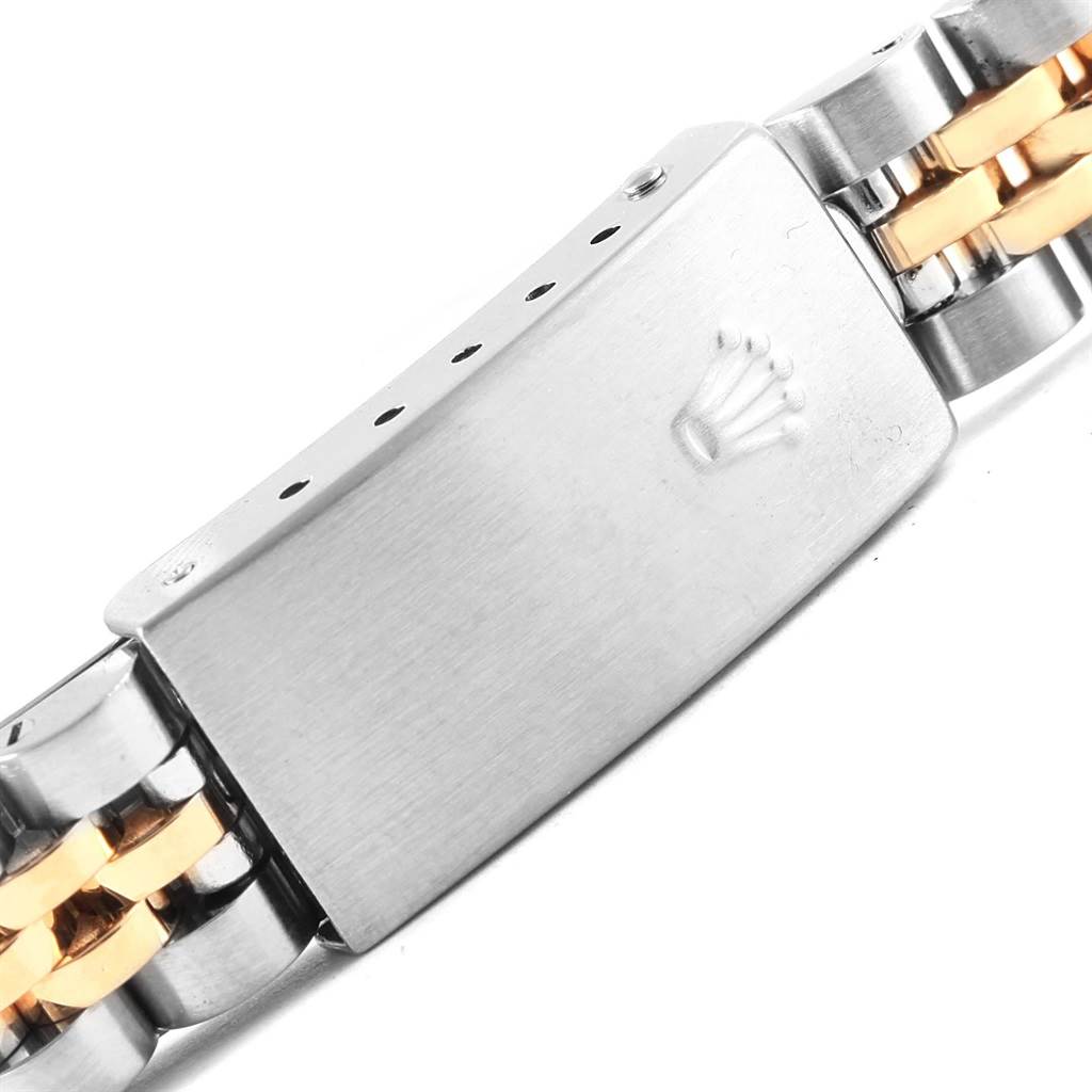 This image shows the bracelet clasp of a Rolex Datejust 69173 Women's Stainless Steel Champagne Dial 69173 Women's Stainless Steel Champagne Dial watch, featuring a two-tone design and the Rolex logo.