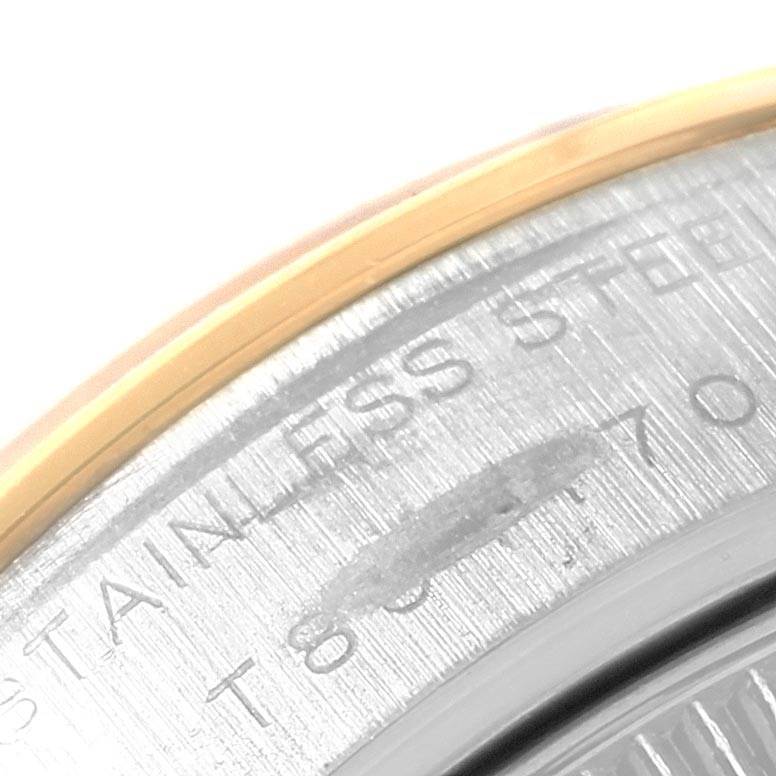 The image shows a close-up of the case back of a Rolex Datejust 69163 Women's Stainless Steel Grey Dial 69163 Women's Stainless Steel Grey Dial watch, focusing on the edge with engraved text "STAINLESS STEEL."