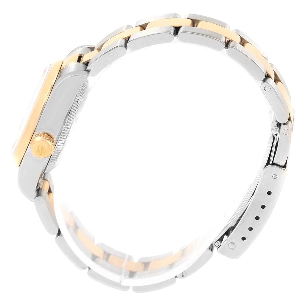 This image shows a side view of a Rolex Datejust 69163 Women's Stainless Steel Grey Dial 69163 Women's Stainless Steel Grey Dial watch, focusing on the crown, case, and stainless steel and gold bracelet.