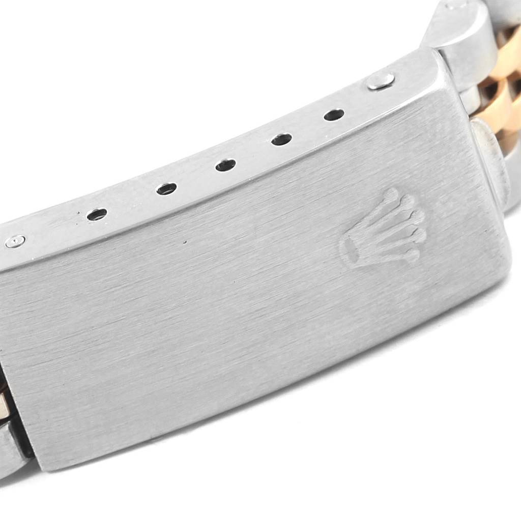 This image shows a close-up view of the clasp of a Rolex Datejust 69173 Women's Stainless Steel Champagne Dial 69173 Women's Stainless Steel Champagne Dial watch, highlighting the Rolex crown logo.