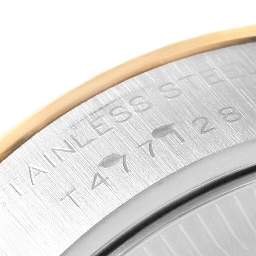 This image displays a close-up of the case back engraving of a Rolex Datejust 69173 Women's Stainless Steel Champagne Dial 69173 Women's Stainless Steel Champagne Dial watch.